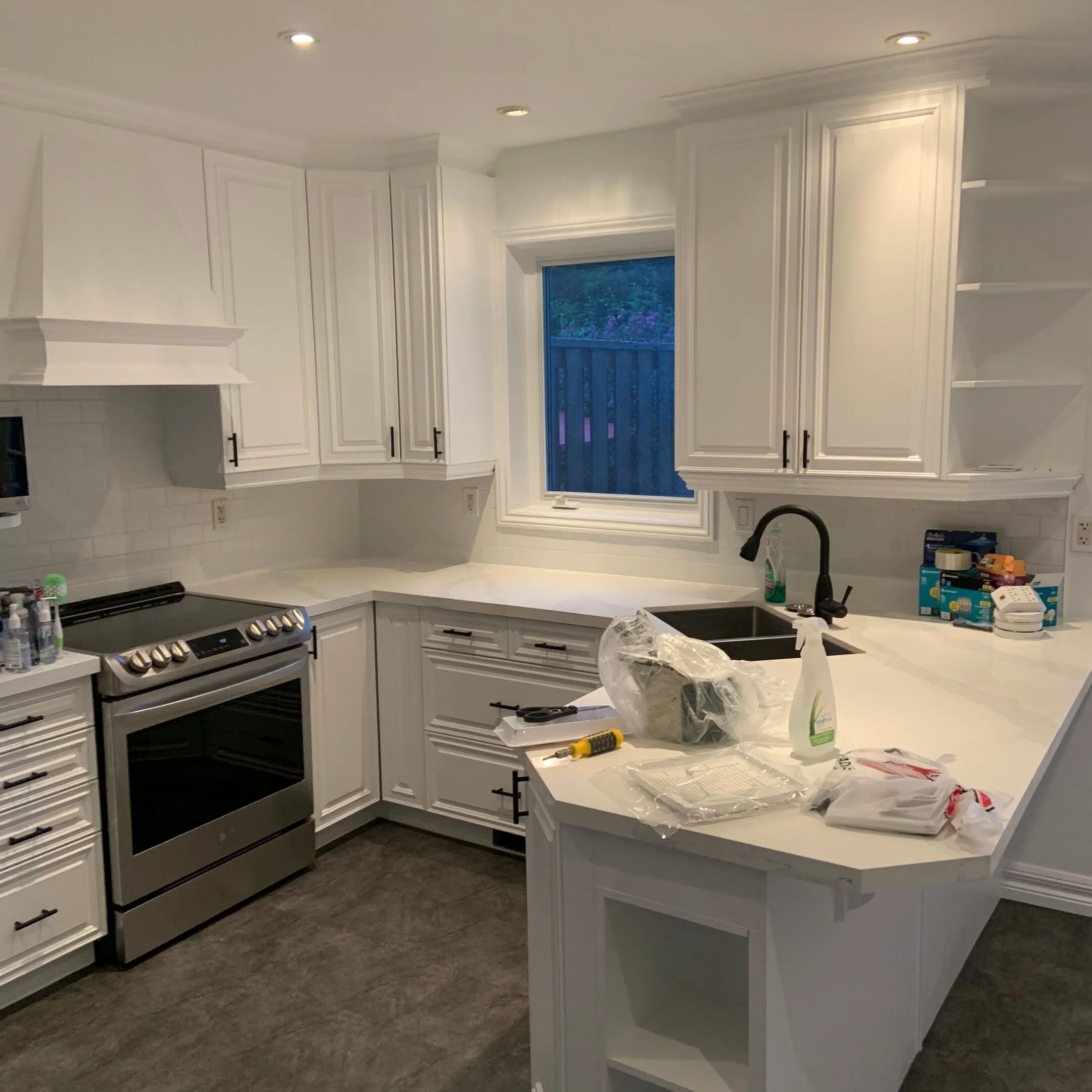 Kitchen cabinet refacing and spray painting by Belardi Brothers — Greater Toronto Area